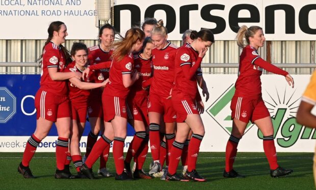 Aberdeen Women celebrate their 5-1 victory over Motherwell, which was their fifth win in a row back in February.