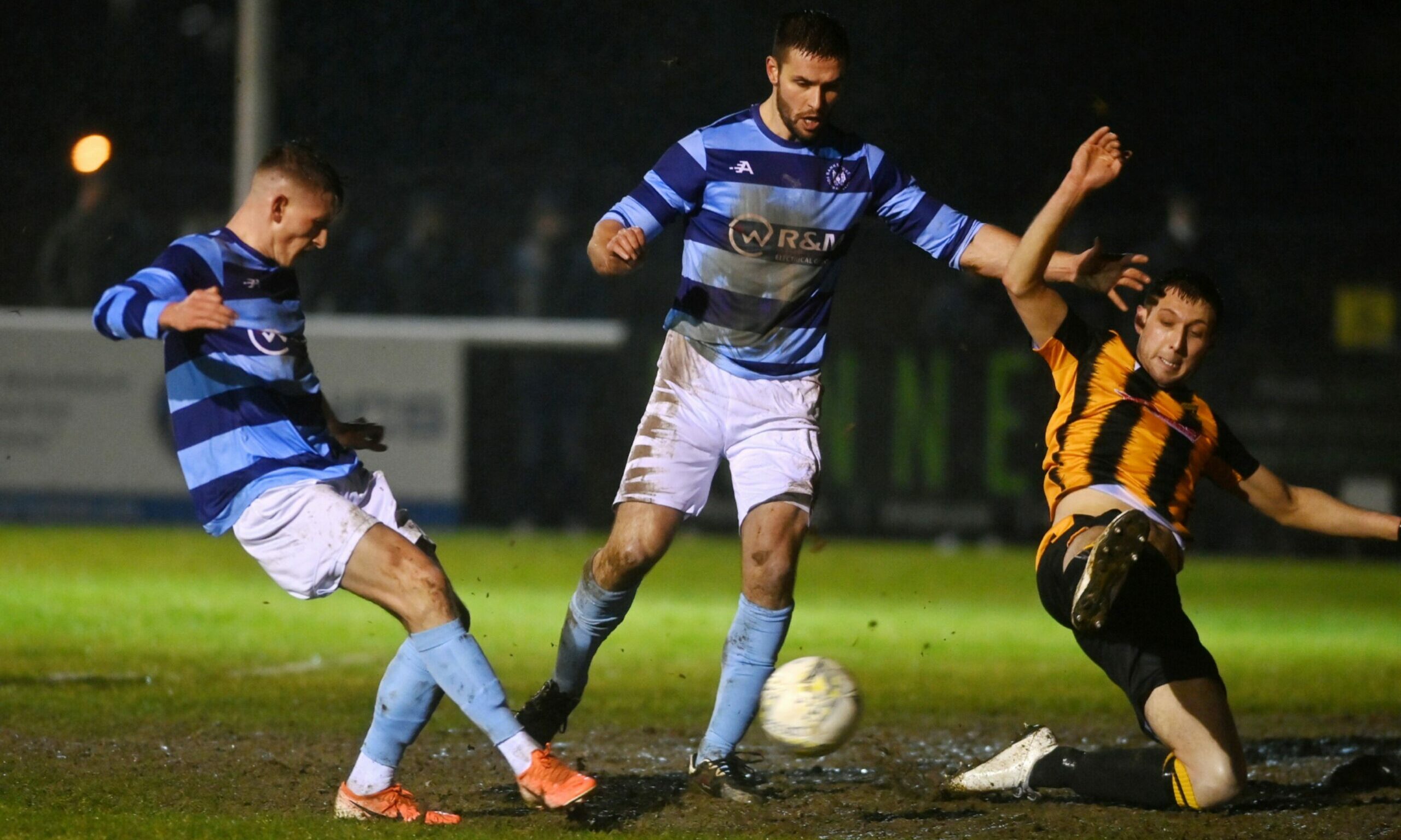 Lewis Crosbie, left, of Banks o' Dee is denied by Michael Clark of Huntly, right
