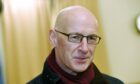Deputy First Minister John Swinney said a football facility can bring benefits but he did not confirm if public funds should be used to support it.