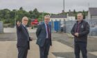 Councillor Roddie Mackay (left) and Alex MacLeod, chief executive of Stornoway Port Authority (right), meet with Secretary of State Michael Gove in Stornoway, Isle of Lewis