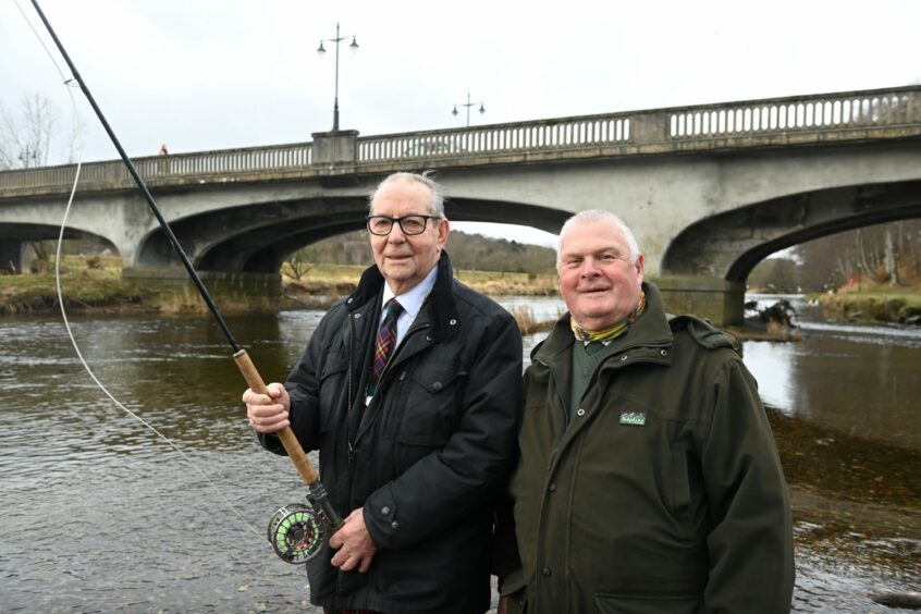 Deputy Lord Provost Ron Mckail, left, was given the honour of first cast. He is pictured here with  Fred Hay from the Inverurie Angling Association. Picture by Paul Glendell.