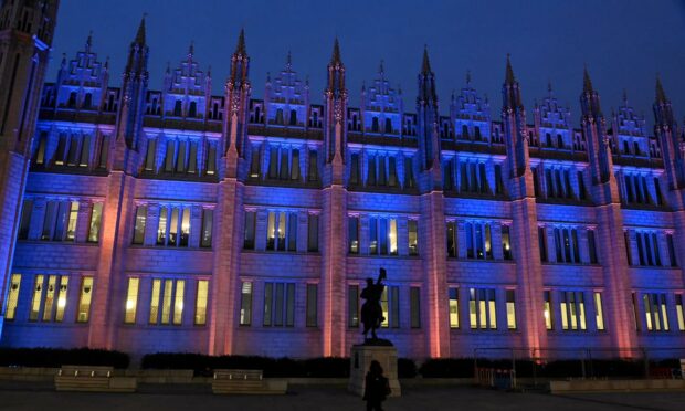The colours of the Ukrainian flag have lit up Marischal Square. Photo: Paul Glendell/DCT Media.