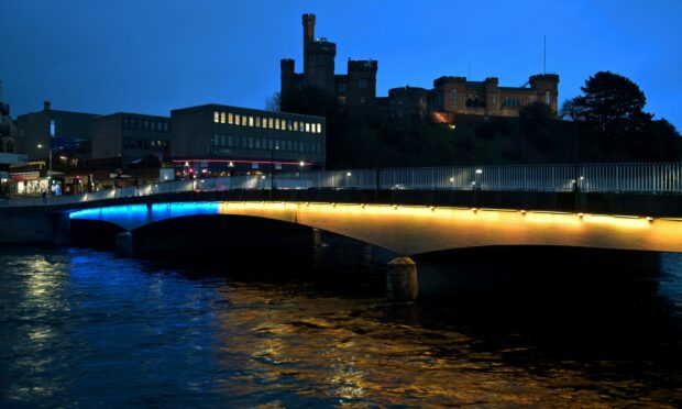 Ness Bridge lit up in the colours of the Ukrainian flag. Picture by Sandy McCook.