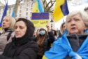 Ukrainians hold a protest against the Russian invasion of Ukraine outside Downing Street, central London. Stefan Rousseau/PA Wire