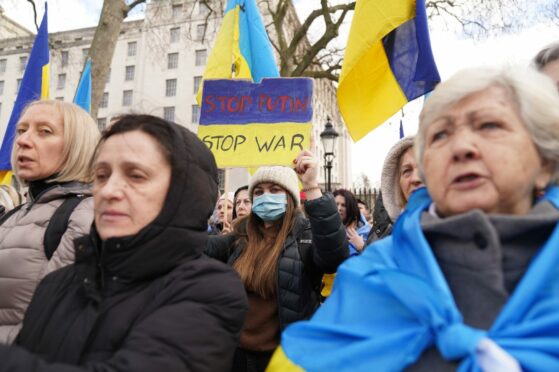 Ukrainians hold a protest against the Russian invasion of Ukraine outside Downing Street, central London. Stefan Rousseau/PA Wire
