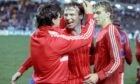 Alex McLeish (centre) celebrates the European Cup Winners' Cup Final win with Eric Black (left) and Neale Cooper