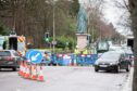 Scottish Water is fixing a burst water mains at Queen's Cross roundabout in Aberdeen. Picture: Wullie Marr/DCT Media