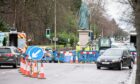 Scottish Water is fixing a burst water mains at Queen's Cross roundabout in Aberdeen. Picture: Wullie Marr/DCT Media