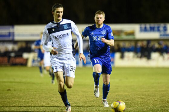 Peterhead midfielder Alan Cook, right, in action against Dundee