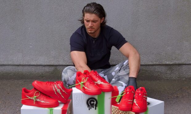 Putting the right foot forward: Cameron Robbie is creating over 30 pairs of trainers for children who are supported by the charity Charlie House.