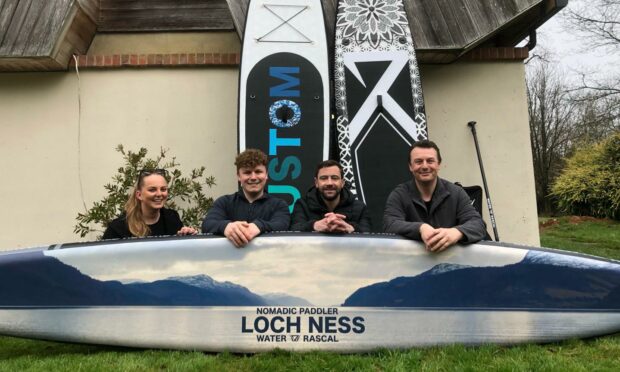 David Haze and the team from Water Rascal with the new board. Picture by David Haze.