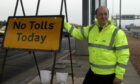 John Swinney celebrates the removal of the Forth bridge tolls.