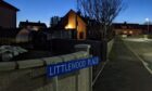 The assault and robbery took place at a property on Littlewood Place in Alford