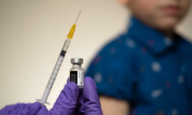 A young boy about to receive a PFizer Covid-19 vaccine. Vaccinating children under five could soon become a reality in the US.