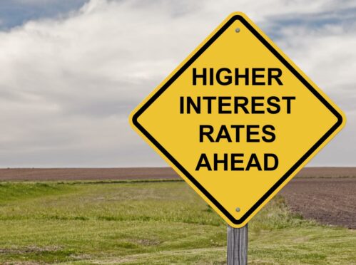 Sign reading: "Higher interest rates ahead."