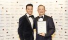 James Barrack, right, with his business leadership award. Also in the picture is comedian, presenter and awards host Des Clarke.