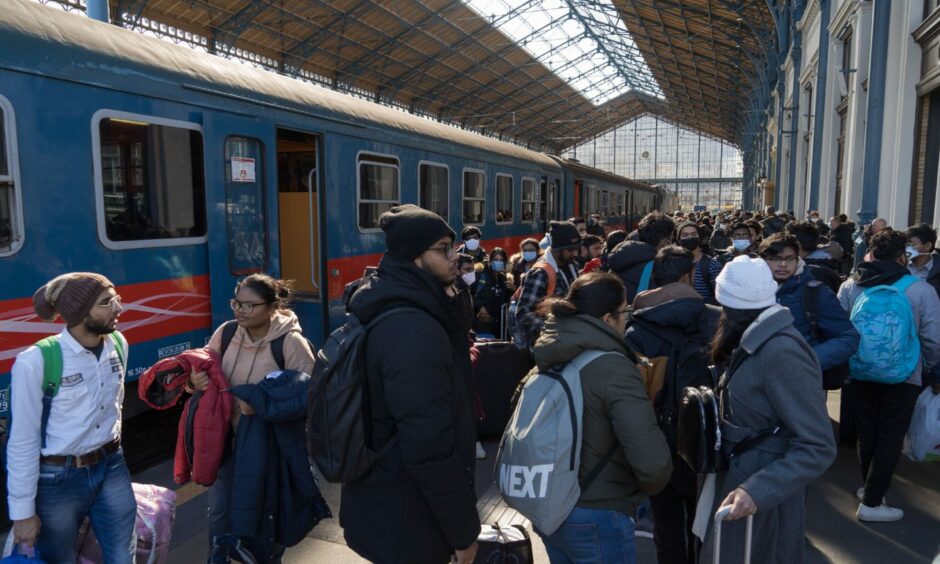 People fleeing Ukraine arrive by train at Western Railway Station in Budapest, Hungary on March 1, 2022. Photo by Xinhua/Shutterstock