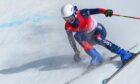 Neil Simpson of Britain competes during the Para Alpine Skiing Men's Super-G Vision Impaired.