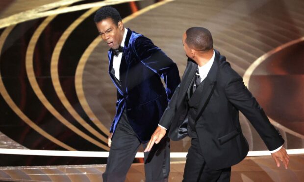 Many men would have felt like doing the same thing as Will Smith but that doesn't make it right. Photo by Myung Chun/Los Angeles Times/Shutterstock