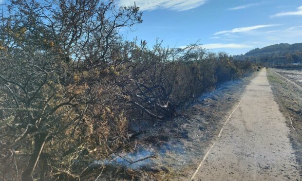 Firefighters are currently working to extinguish a gorse fire at Merkinch Local Nature Reserve.