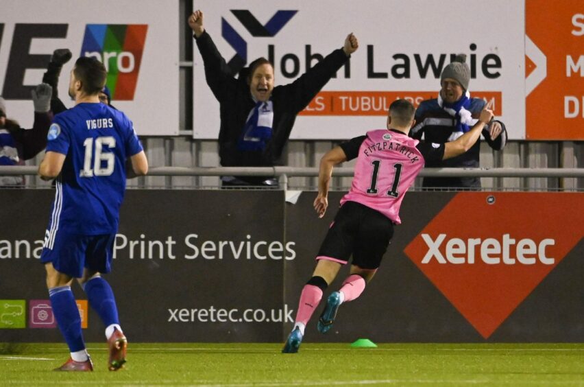 Aidan Fitzpatrick celebrates putting Queen of the South in front against Cove Rangers