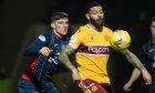 Ross Callachan in action for Ross County against Motherwell. Image: SNS