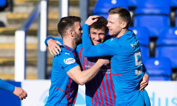 Reece McAlear celebrates after making it 2-0 to ICT.