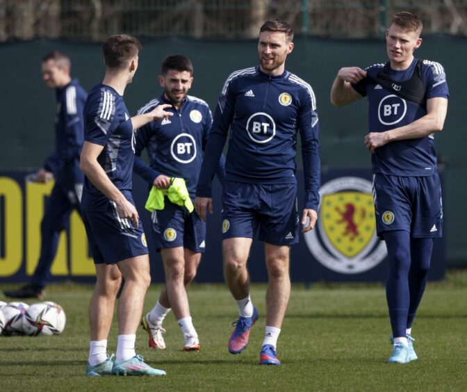 Scott McTominay, right, with Kieran Tierney, Greg Taylor and Stephen O'Donnell