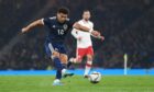 GLASGOW, SCOTLAND - MARCH 24: Scotland's Che Adams has a shot on goal during an International Friendly between Scotland and Poland at Hampden Park, on March 24, 2022, in Glasgow, Scotland. (Photo by Craig Foy / SNS Group)