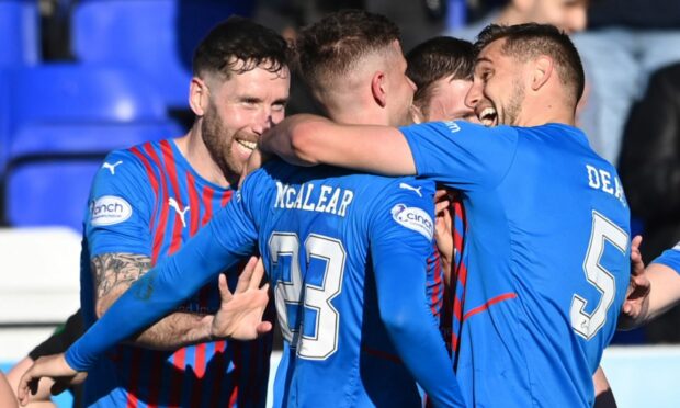 Reece McAlear celebrates opening the scoring for Caley Thistle against Dunfermline.