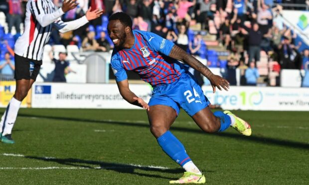 Austin Samuels celebrates scoring for Caley Thistle against Dunfermline Athletic.