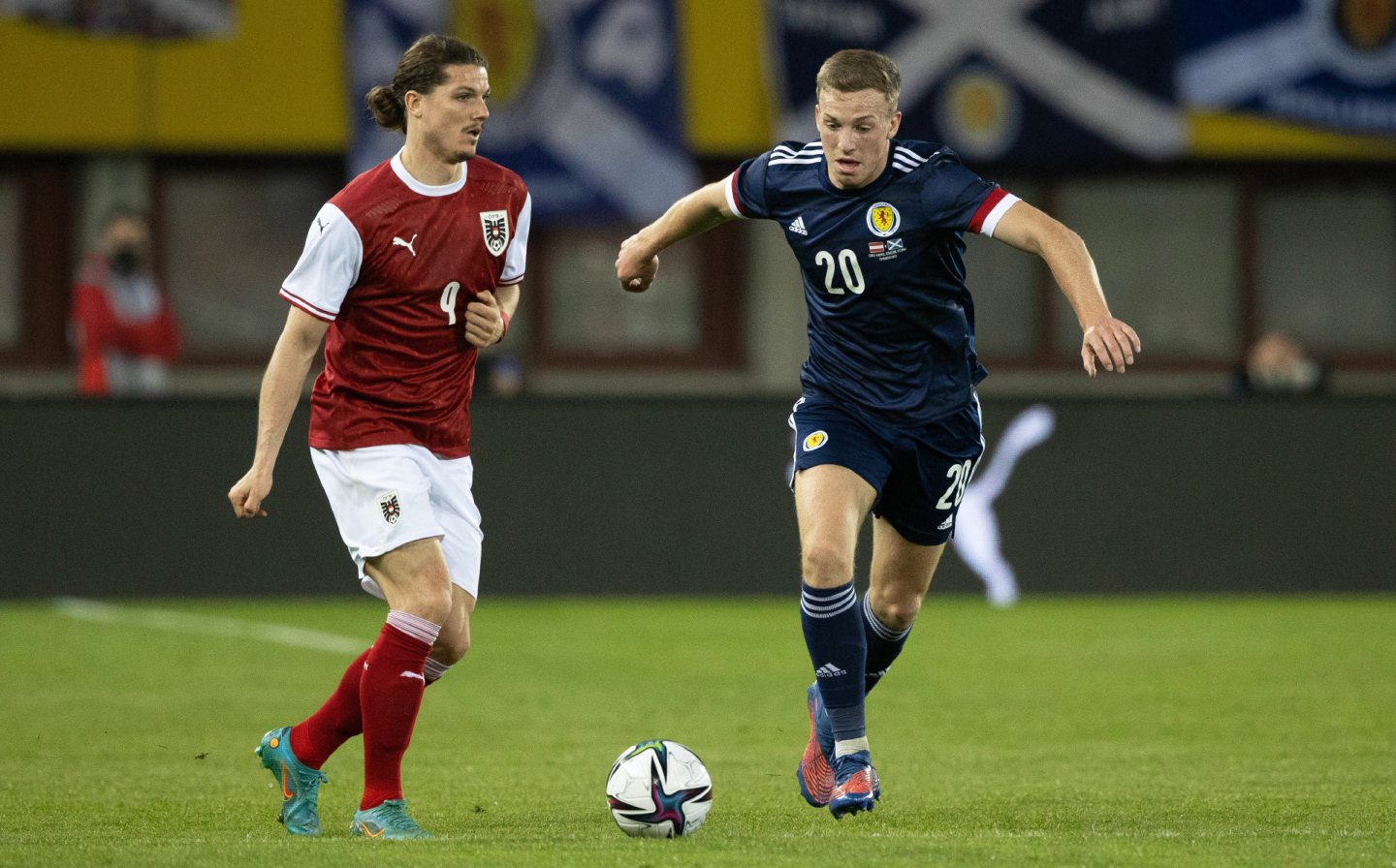 Austria's Martin Hinteregger and Scotland's Lewis Ferguson in action in the friendly in Vienna.