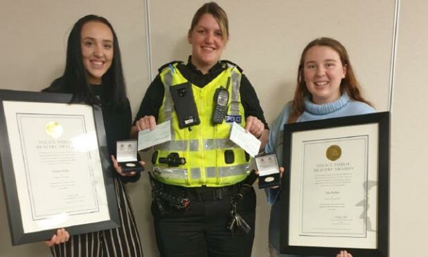 Isla and Eilidh Noble and Inspector Jennifer Cordiner.