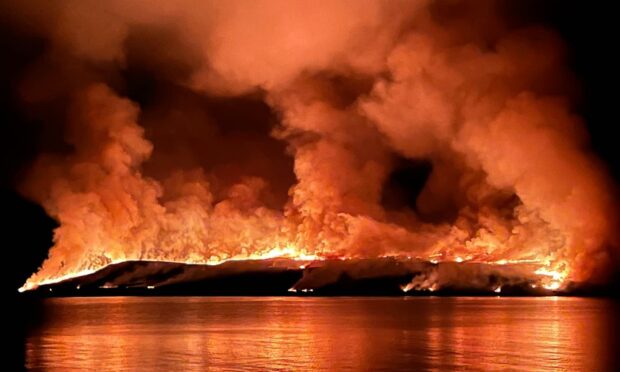 Gruinard Island ablaze on Saturday evening. Picture by Nessie Gearing.