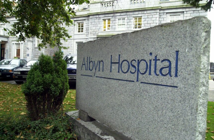Granite sign for Albyn private hospital in Aberdeen city. 