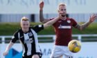 Russell Dingwall, left, in action for Elgin City against Kelty Hearts.