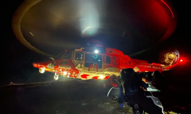 Coastguard rescue helicopter and police teams assisted Aberdeen and Braemar MRTs in the eight-hour operation. Image supplied by Braemar MRT.