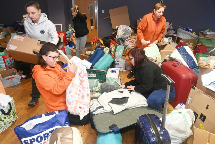Volunteers packing donations at Craigievar House. Picture by Chris Sumner.
