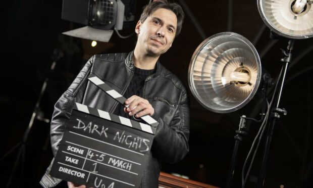 Dr Calum Waddell shouts action for the start of  Dark Nights film festival staged by the University of Aberdeen.