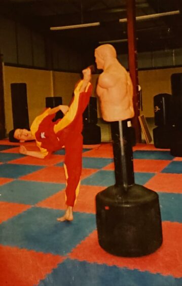 Colin Cass taking karate classes as a youth.