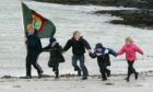 Island children celebrated when the community bought Gigha in 2002
