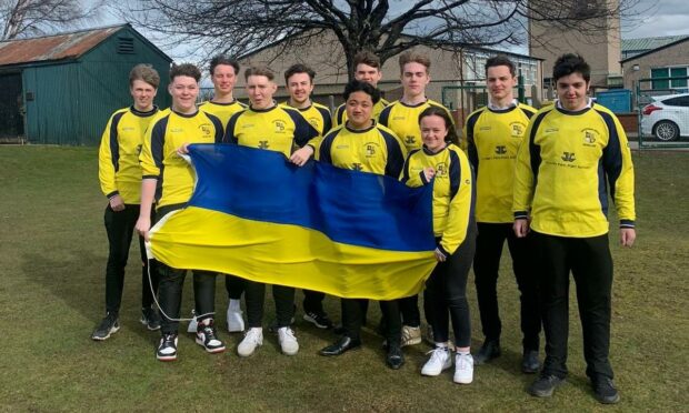Students from Invergordon Academy are looging their times as part of their "running for Ukraine" event.