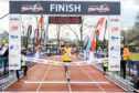 Sean Chalmers claims victory in the Inverness half marathon.