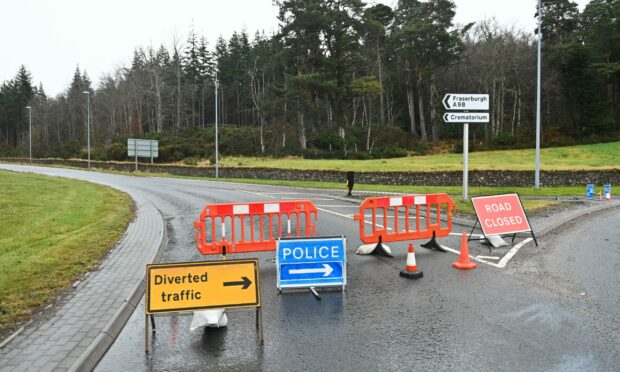 The road leading to the A98 at Fochabers/Buckie Roundabout has been closed off since around 04:30am.
Pictures by Jason Hedges