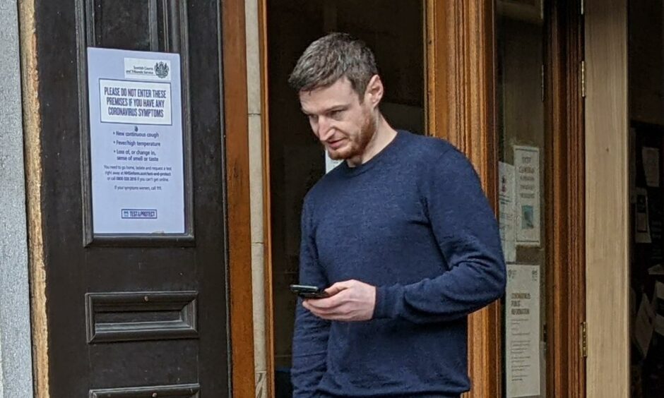 James Thouless walking out of Aberdeen Sheriff Court