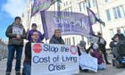 People gathered outside Marischal College to portest the "spiraling" cost of living. Picture by Kenny Elrick.