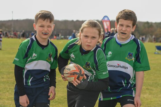 From left, Harry Dunn, 10, Agnes Brock, 11, Angus Macleod, 10 at Ellon Meadows.