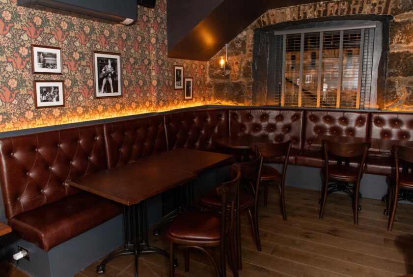 Another interior shot showing the seating of the Under the Hammer pub in Aberdeen. 