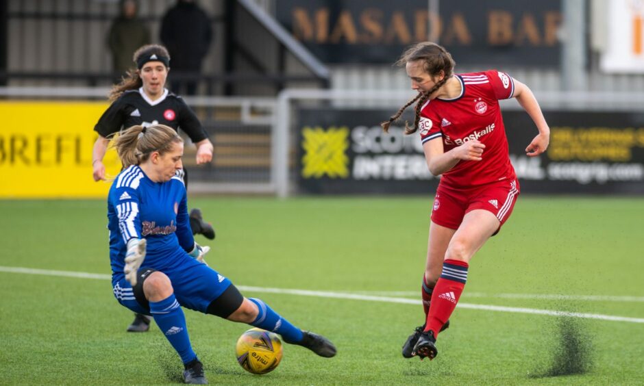 Aberdeen's Bayley Hutchison scores against Hamilton Accies at Balmoral Stadium.