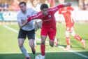 Highland League game of the day between Brechin City and Brora Rangers. Brora's Martin Maclean and Brechin's Seth Patrick. CR0034403 26/03/22 Picture by KATH FLANNERY